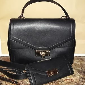 Micheal Kors black purse and matching wallet